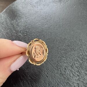 10k yellow and rose gold ring. Image of an angel
